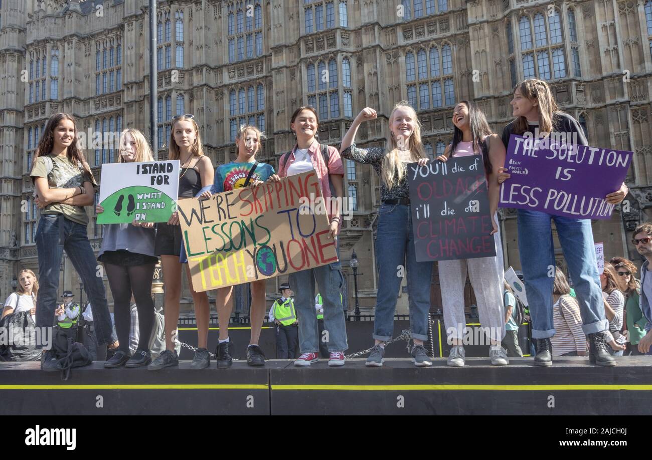 London / UK - September 20th 2019 - Group of female climate strike protesters demonstrating against climate change outside Parliament in Westminster Stock Photo