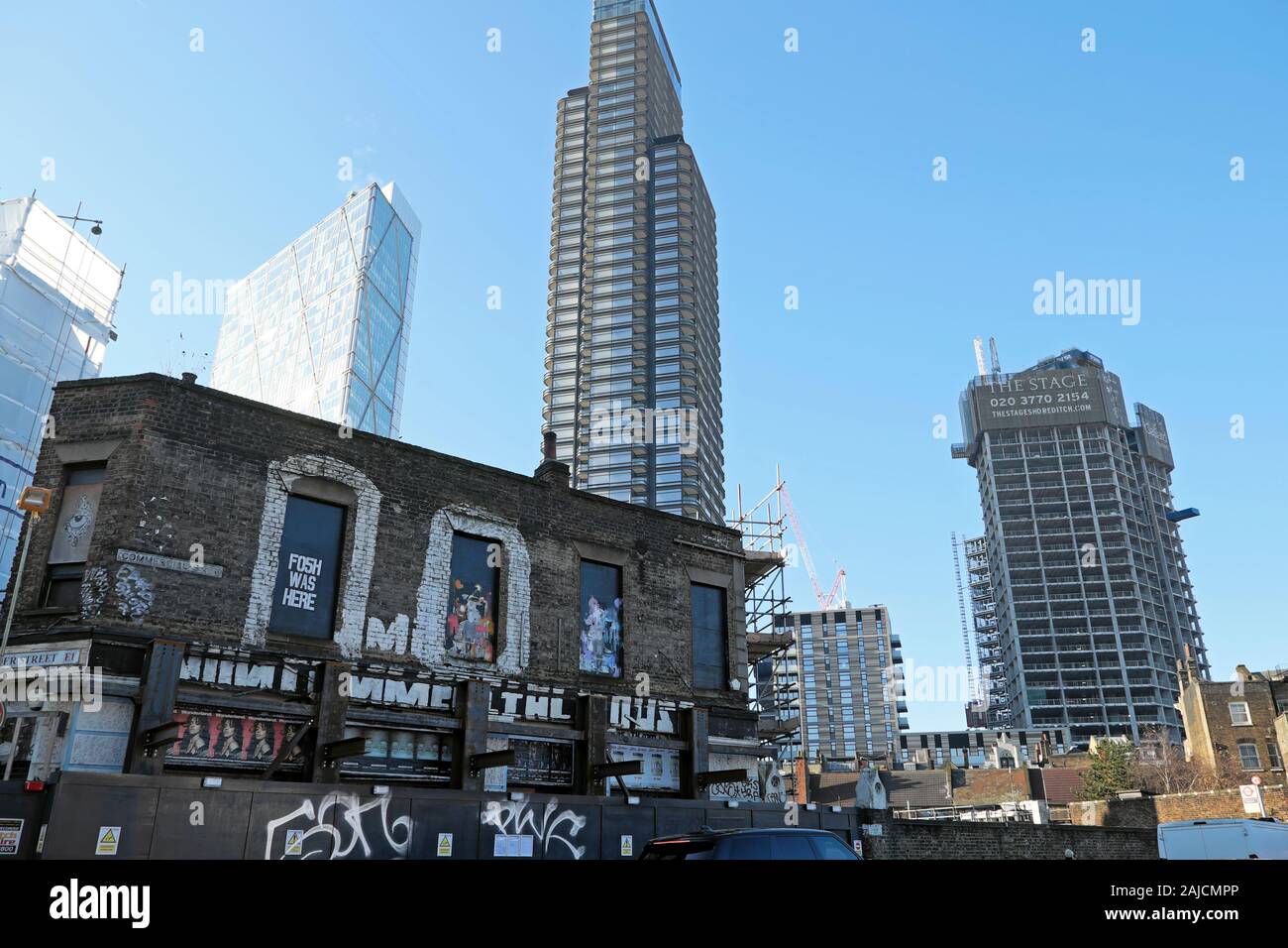 View of old & new buildings Principal Place & The Stage high rise residential tower under construction from Commercial Street London  UK KATHY DEWITT Stock Photo