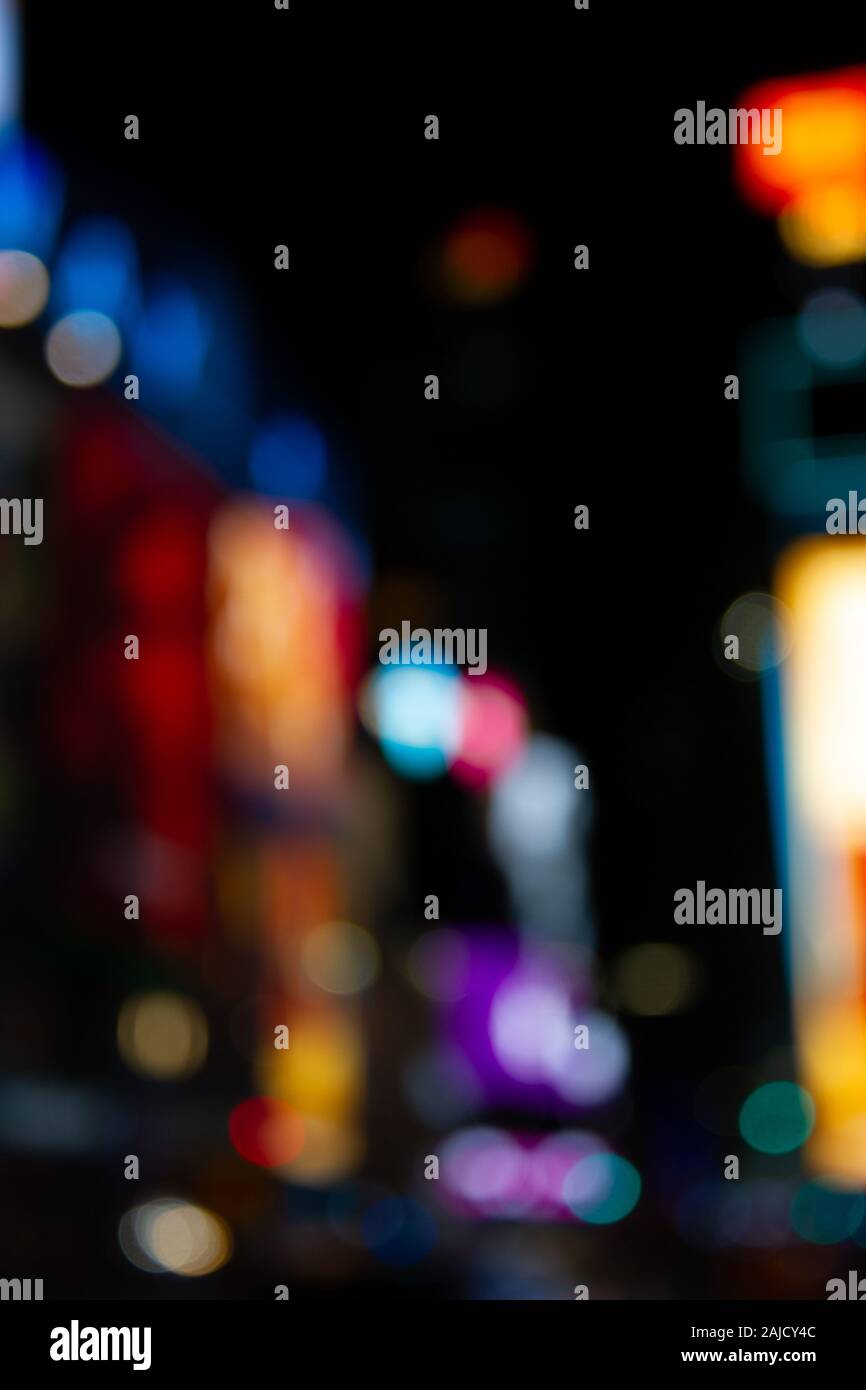 Abstract Bokeh city lights at night from Times Square in New York City ...