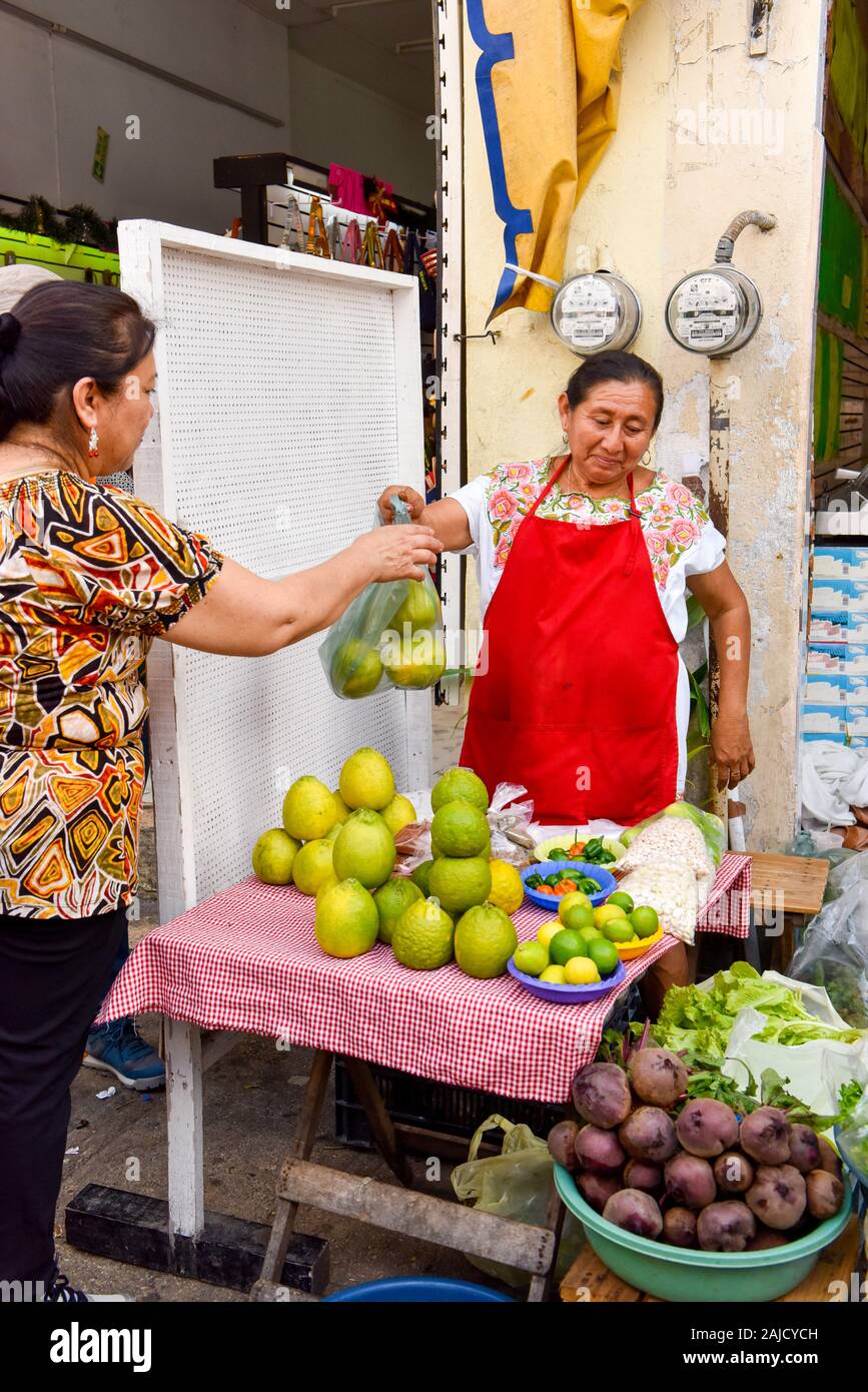 Shopper and food vendor outside Lucas Galvez Market, Merida , Yucatan Mexico Stock Photo