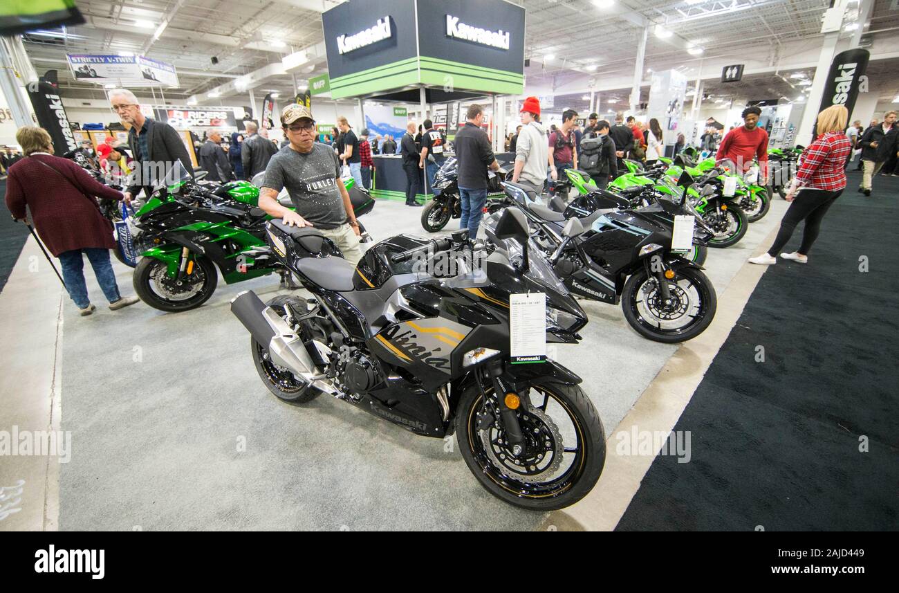 Toronto, Canada. 3rd Jan, 2020. People view Kawasaki motorcycles at the  2020 North American International Motorcycle