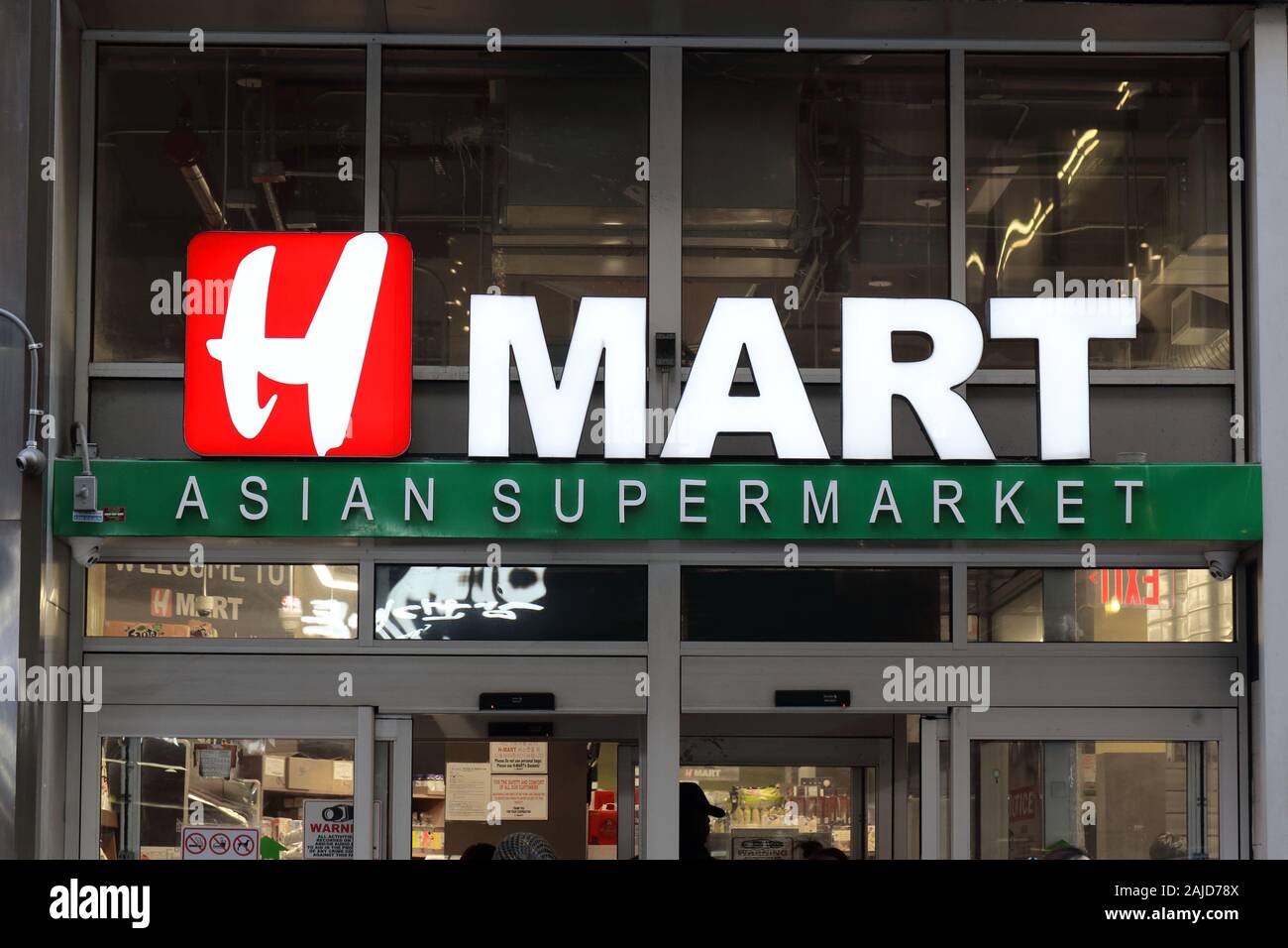 The H Mart logo at a store in New York, NY Stock Photo
