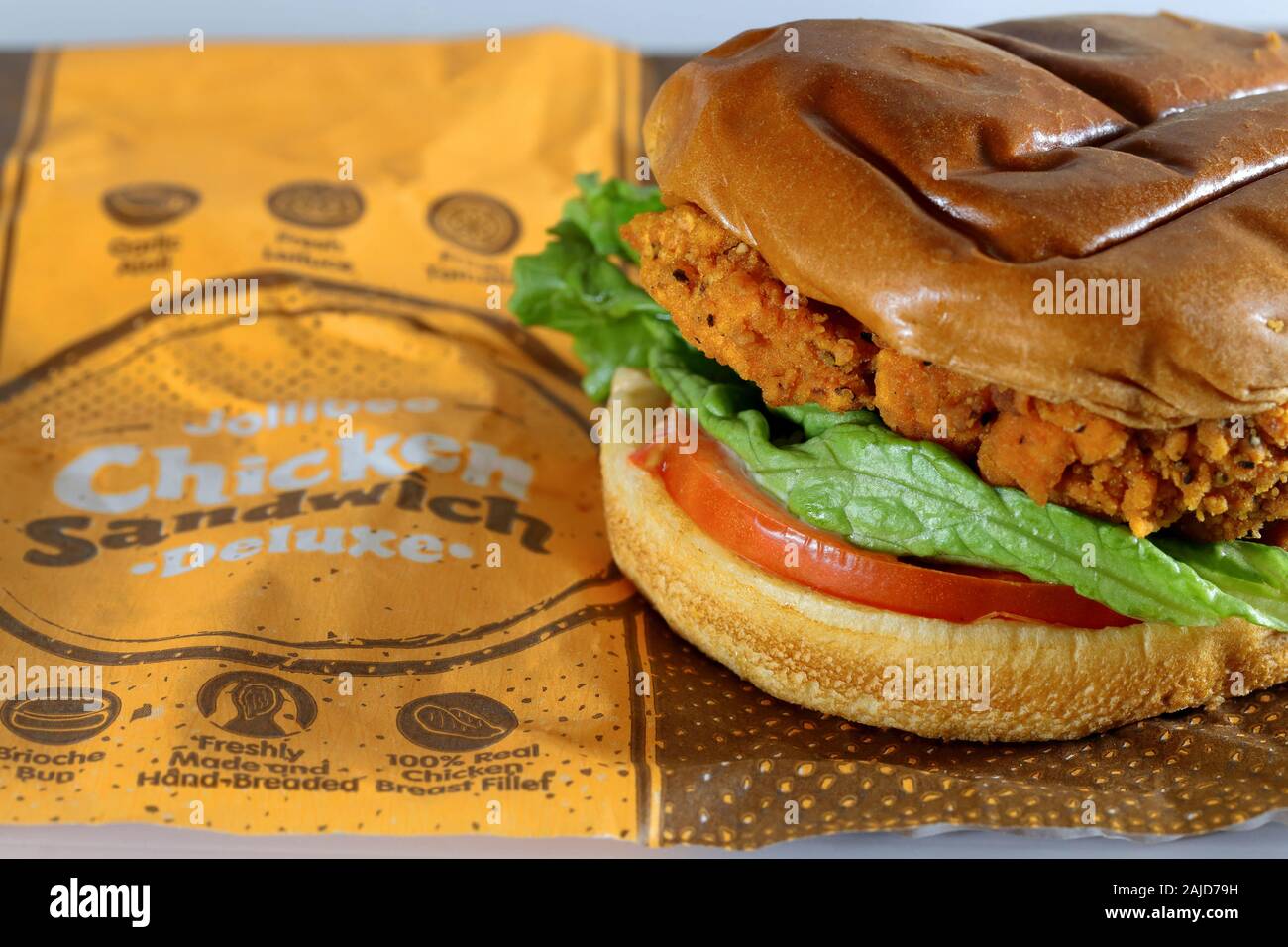 A Jollibee Chicken Sandwich Deluxe On A Wrapper Stock Photo Alamy a-jollibee-chicken-sandwich-deluxe-on-a-wrapper-stock-photo-alamy