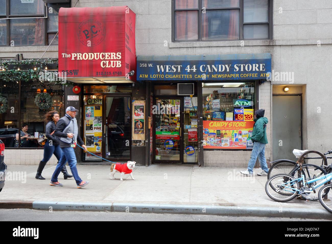 The Producers Club, Candy Store, 358 West 44th Street, New York, NY. exterior storefronts of theater and convenience store in hell's kitchen manhattan Stock Photo