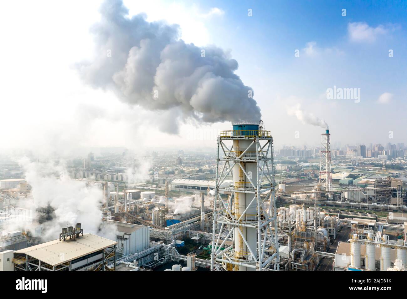 Aerial view of industrial area with chemical plant. Smoking chimney from factory Stock Photo