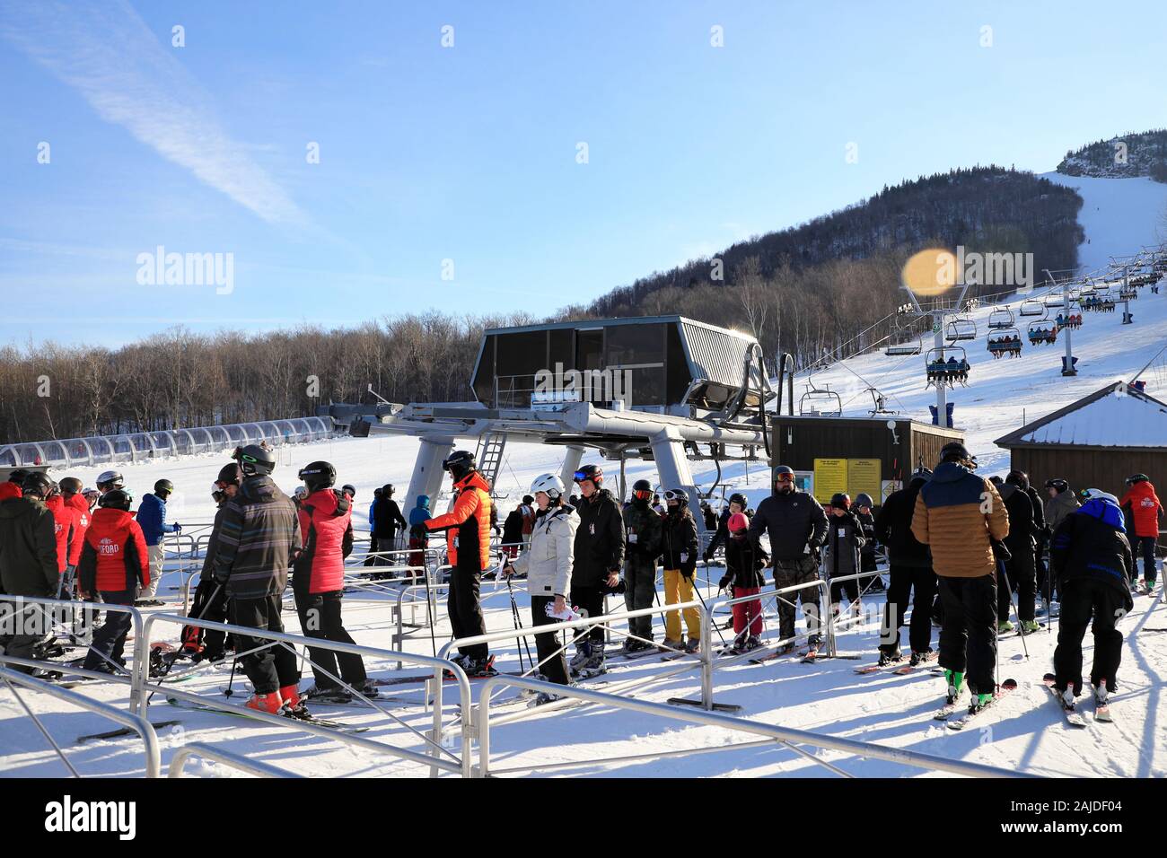 skiers waiting in line to get on Mont Giroux ski lift. Mont-Orford ski resort. Mont-Orford National Park.Orford.Quebec.Canada Stock Photo