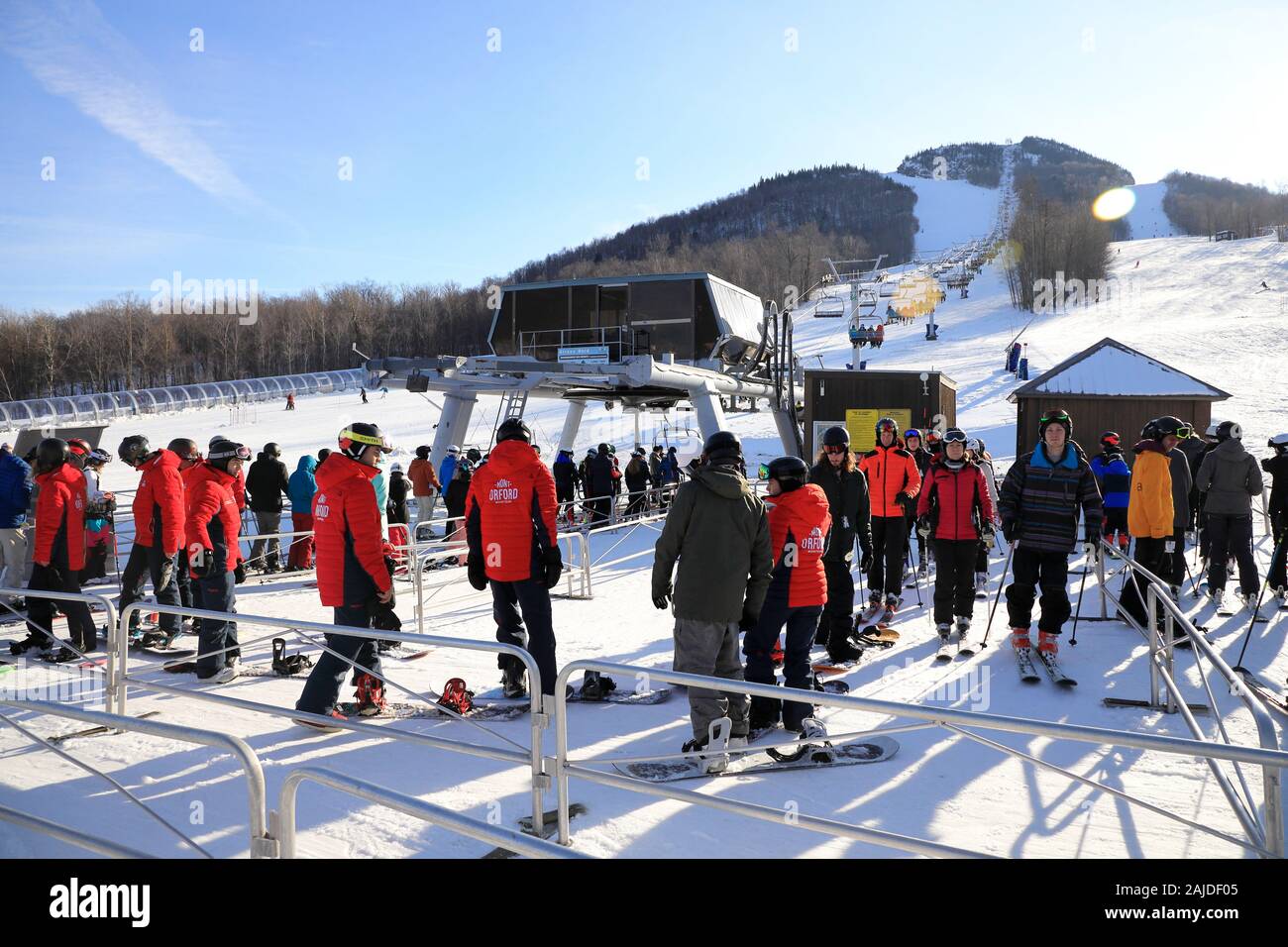 skiers waiting in line to get on Mont Giroux ski lift. Mont-Orford ski resort. Mont-Orford National Park.Orford.Quebec.Canada Stock Photo