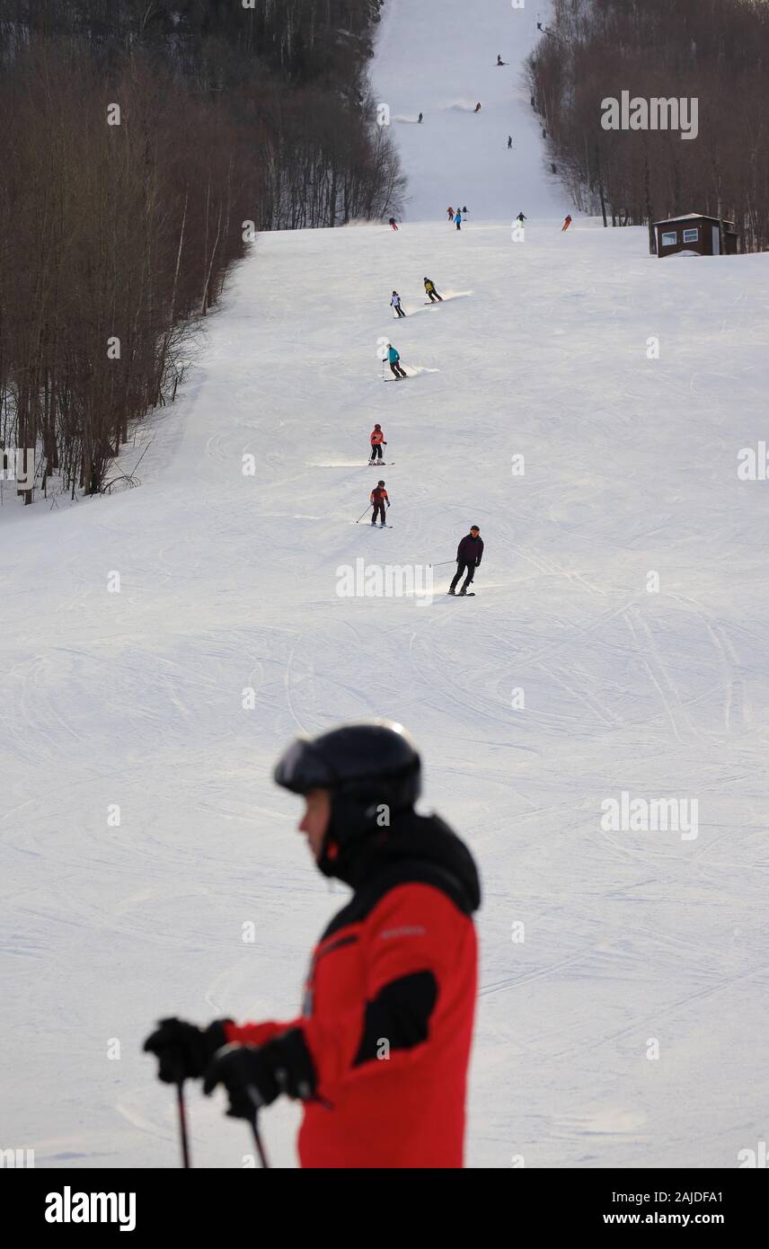 Skiers at Mont Giroux ski slope in Mont-Orford Ski Resort. Mont-Orford ...