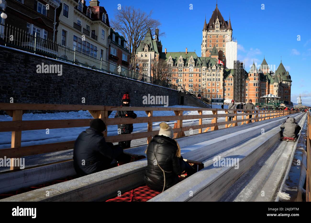 Toboggan Slide on Dufferin Terrace with Fairmont le Chateau Frontenac Hotel in the background