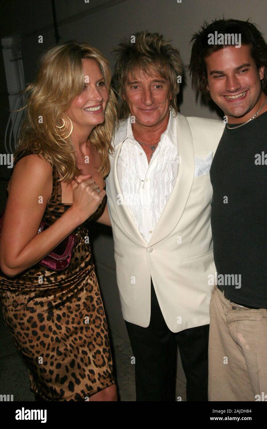 MIAMI,  FL. JANUARY 5 2005: Rocker Rod Stewart and his fiancee, former model Penny Lancaster arrive at Miami International Airport from the UK with their newborn baby, Alastair Wallace Stewart.  January 08, 2006 in Miami, Florida.  People; Rod Stewart, Penny Lancaster, Sean Stewart Stock Photo