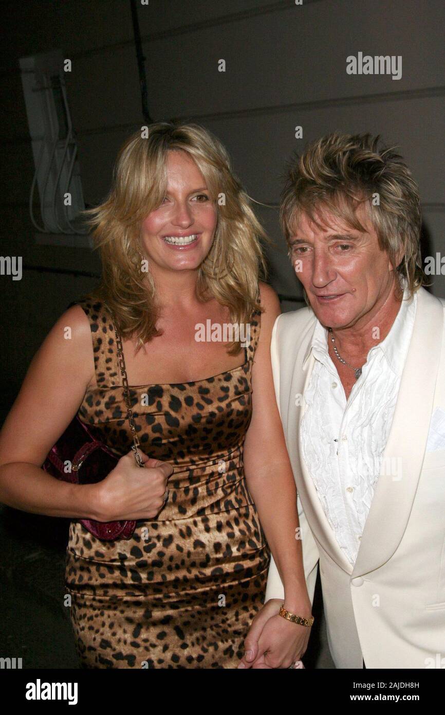 MIAMI,  FL. JANUARY 5 2005: Rocker Rod Stewart and his fiancee, former model Penny Lancaster arrive at Miami International Airport from the UK with their newborn baby, Alastair Wallace Stewart.  January 08, 2006 in Miami, Florida.  People; Rod Stewart, Penny Lancaster Stock Photo