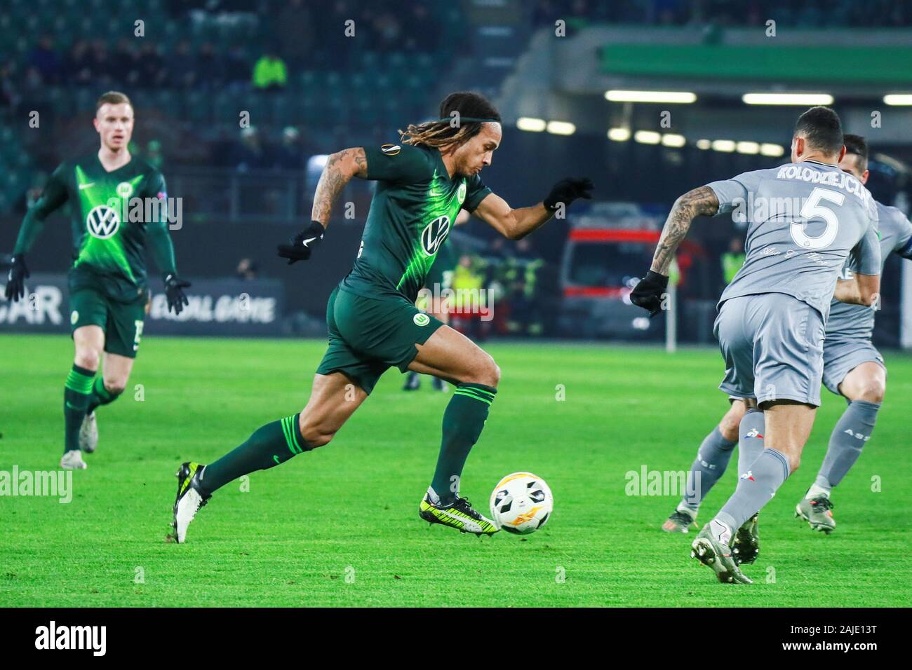 Wolfsburg, Germany, December 12, 2019: Kevin Mbabu of VfL Wolfsburg in action during the UEFA Europa League match between Wolfsburg and Saint Etienne Stock Photo