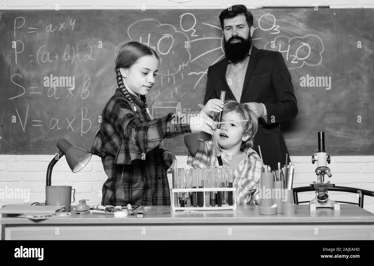 children making science experiments. Education. chemistry lab. happy