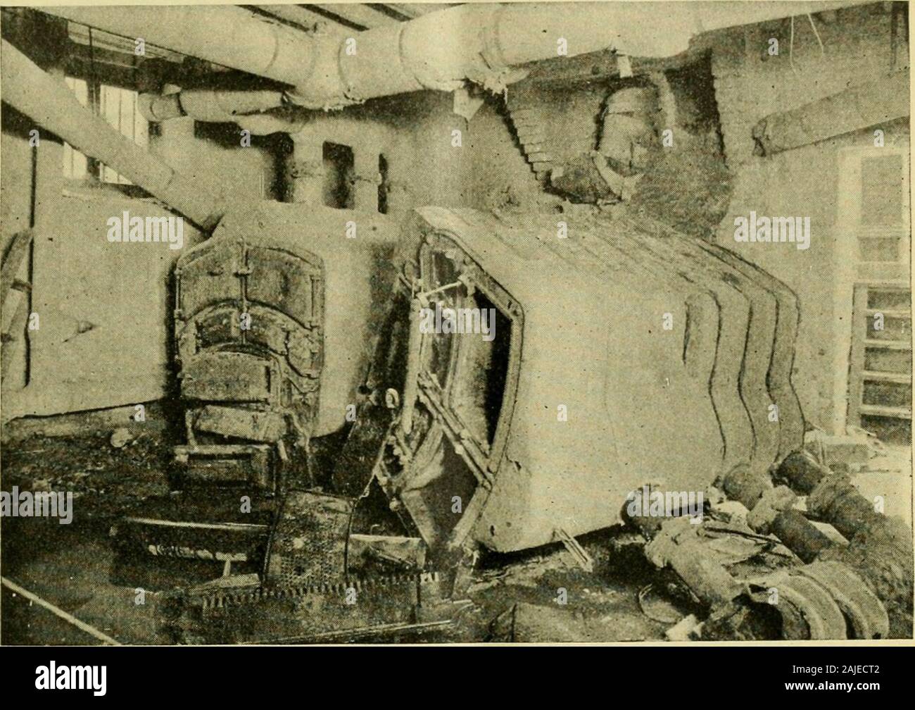 The Locomotive . nd dollars. Fig. 3 gives a general view of theruins, and Fig. 4 gives another view, showing a portion of the ruins on a largerscale. An explosion widely different in character from either of the preceding isillustrated in Fig. 5. The boiler that is here shown was made of cast-iron,and was used for heating purposes only. It was one of a nest of two, both ofwhich are seen in the illustration, although only one exploded. The boilers K)C7.] THE LOCOMOTIVE. 197 were located in the basement of St. Josephs Orphan Asylum, Seventh andSpruce streets, Philadelphia, Pa.; and as the buildi Stock Photo