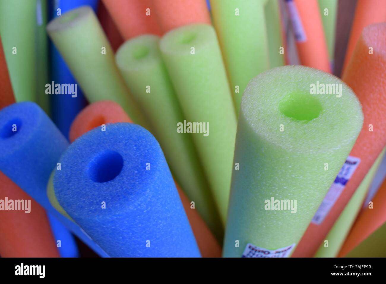 Colorful swim noodles. Stock Photo