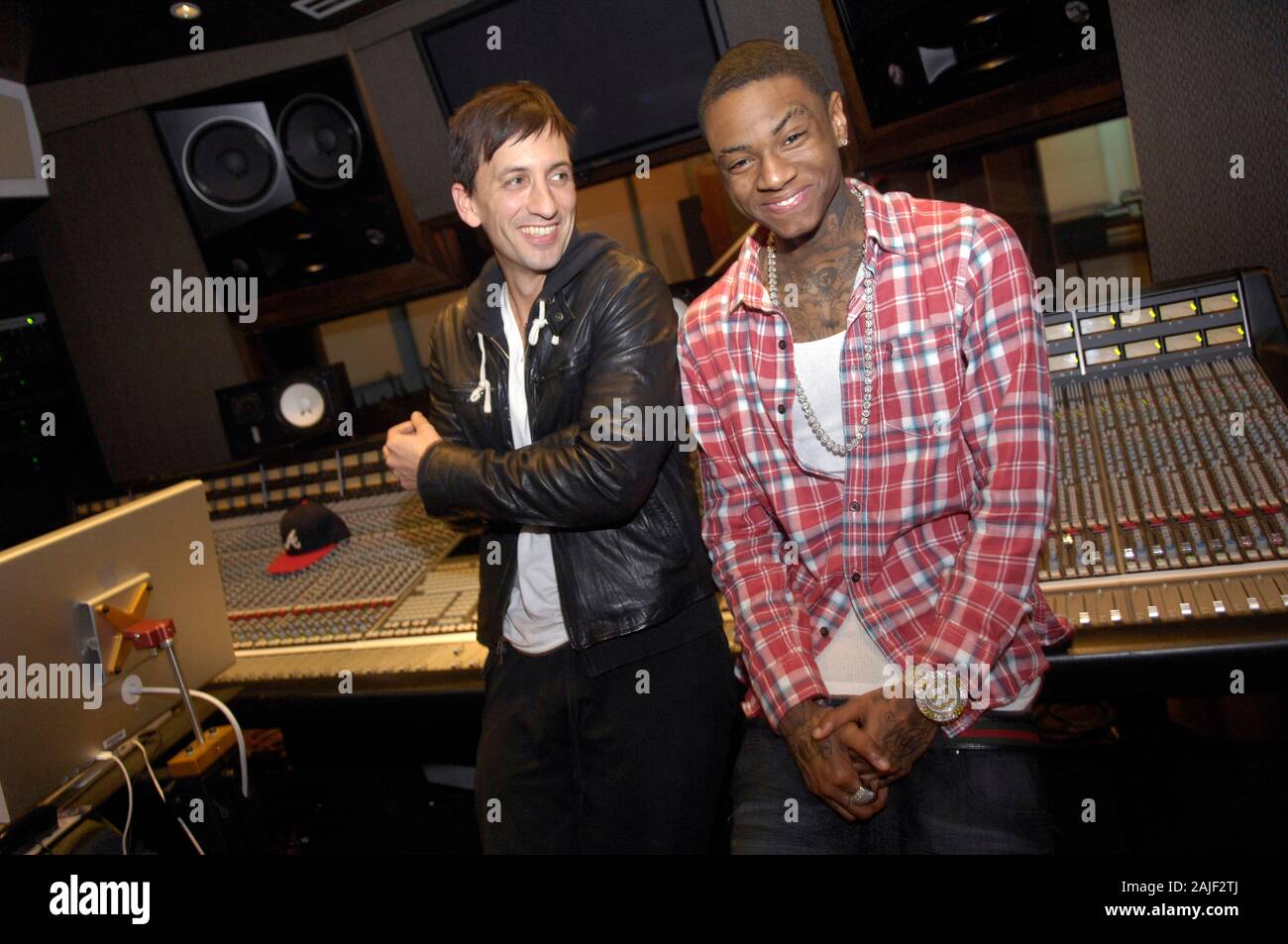 (L-R) Clinton Sparks and Rapper Deandre Way aka Soulja Boy at a recording studio on February 5, 2010 in Los Angeles, California. Stock Photo