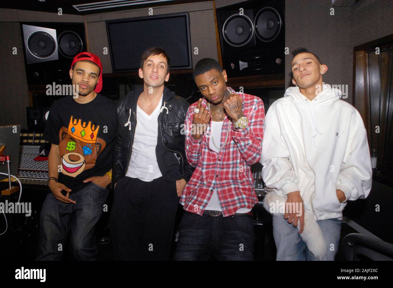 (L-R) Producers Bei Maejor, Clinton Sparks, Rapper Deandre Way aka Soulja Boy and Khleo T at a recording studio on February 5, 2010 in Los Angeles, California. Stock Photo