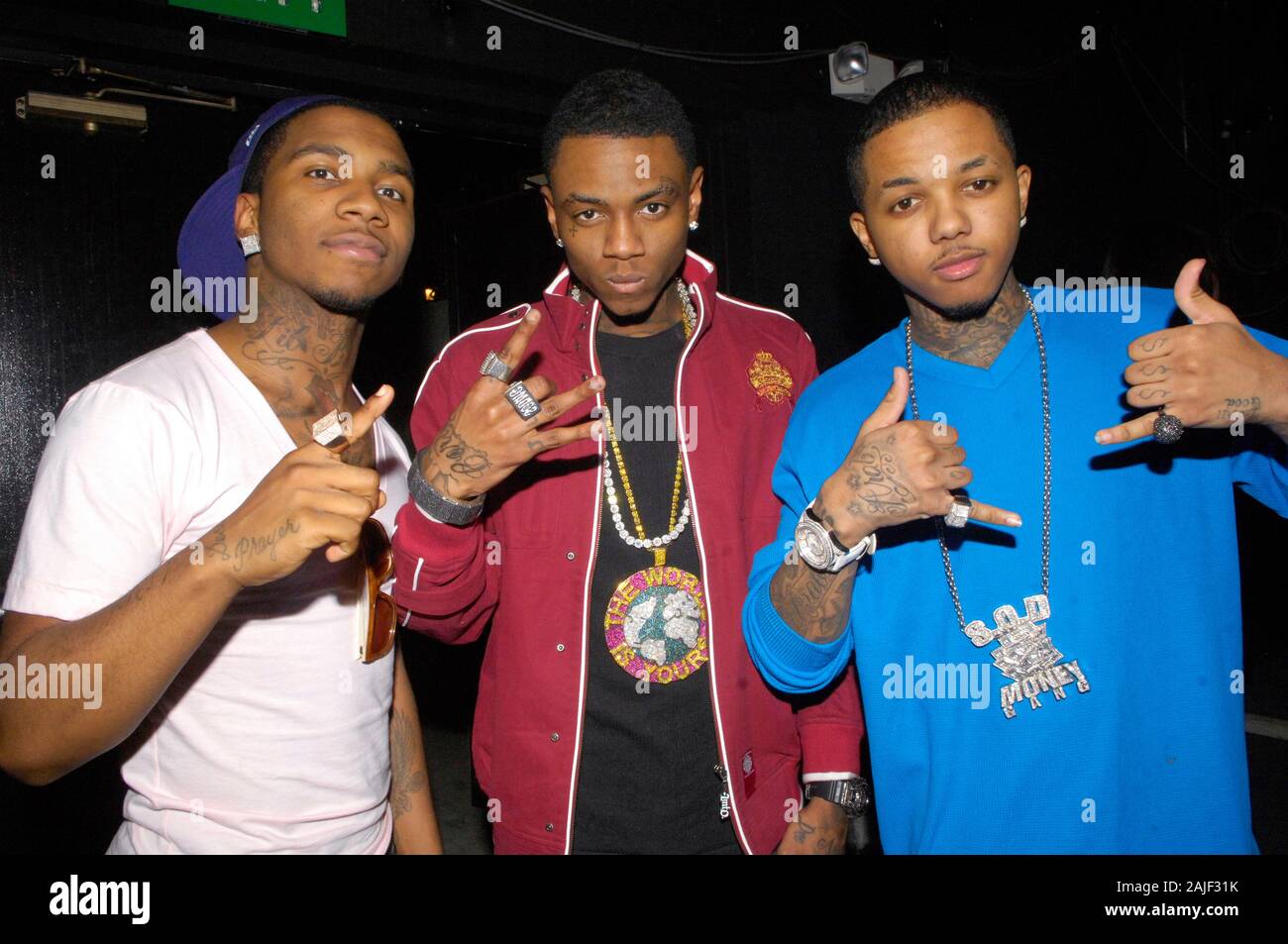 (L-R) Rappers Lil B, Soulja Boy Tell 'Em and ARAB of S.O.D.M.G. attend the premiere of 'School Gyrls' at Six Flags Magic Mountain on February 15, 2010 in Valencia. Stock Photo