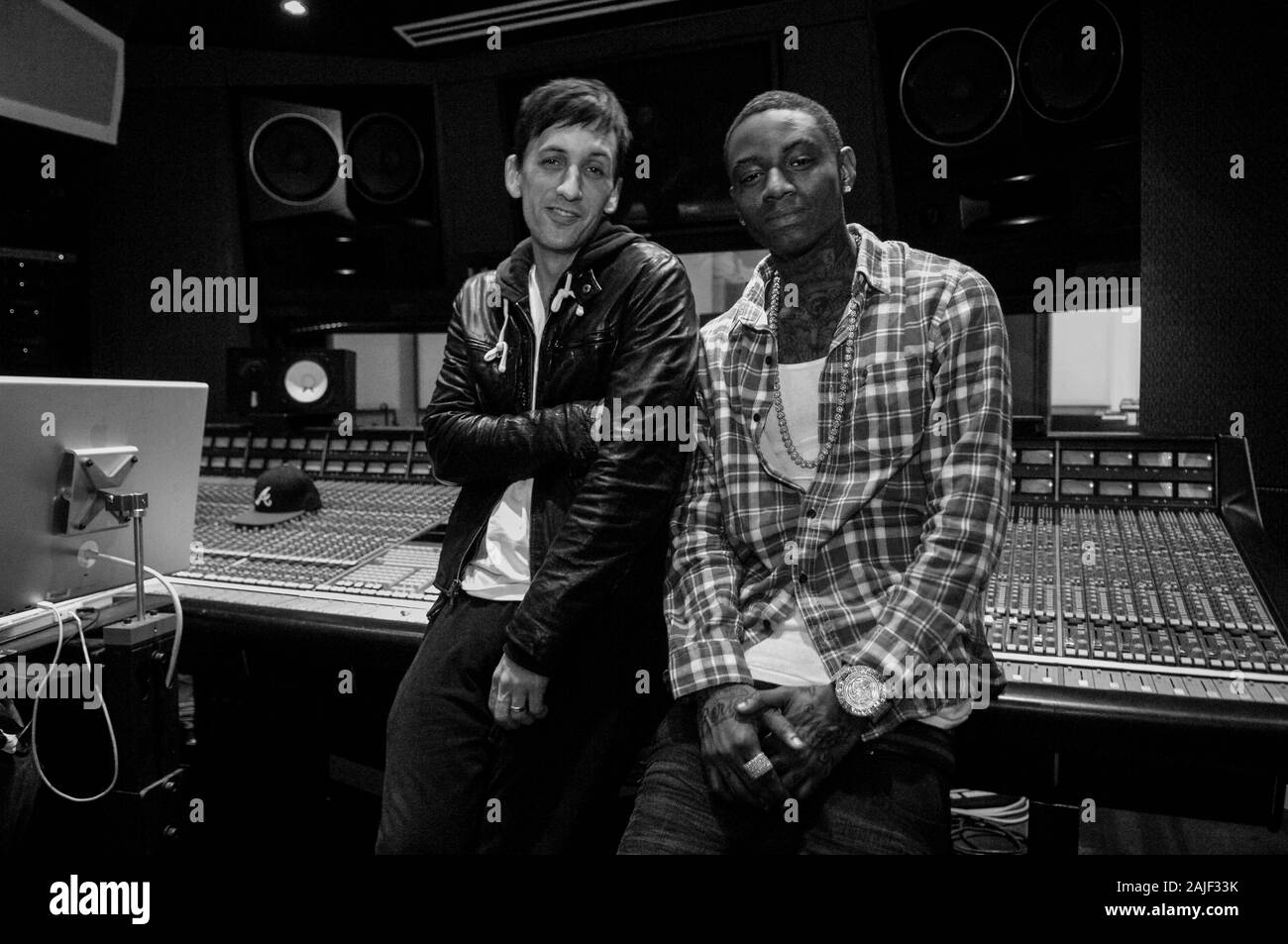 (L-R) Clinton Sparks and Rapper Deandre Way aka Soulja Boy at a recording studio on February 5, 2010 in Los Angeles, California. Stock Photo