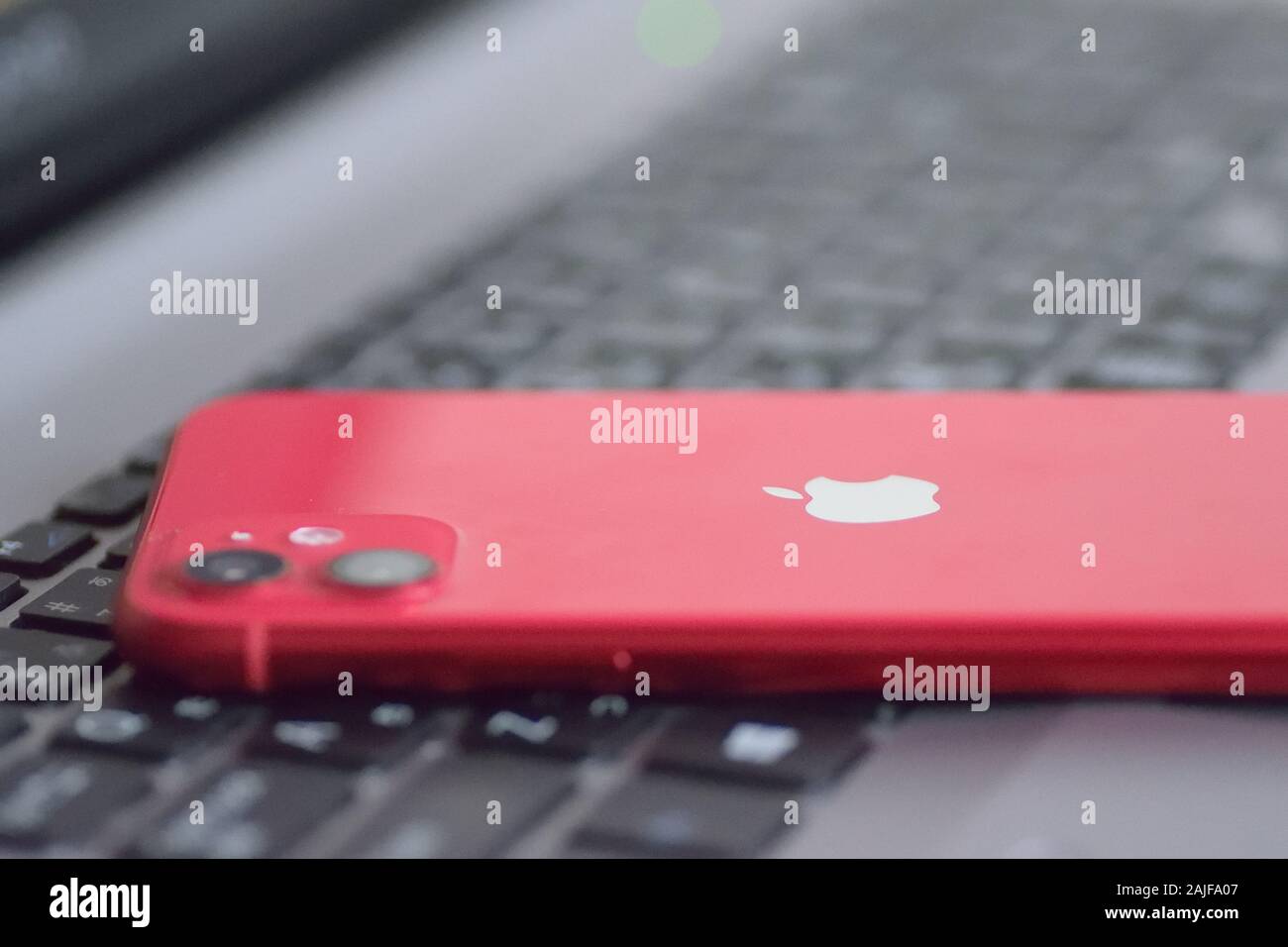 Red color iPhone 11 featuring dual camera released in fall of 2019