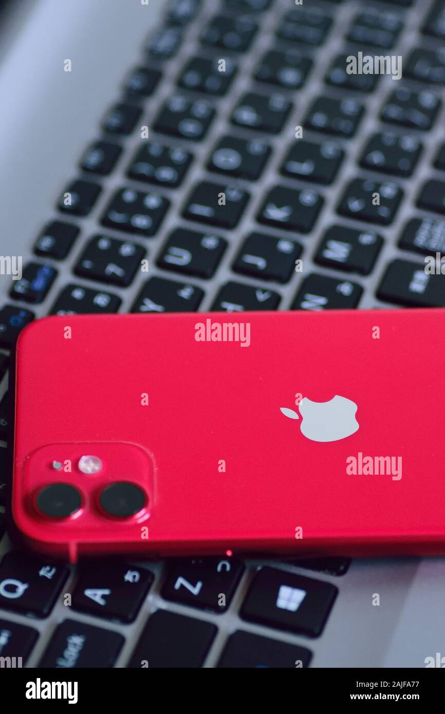 Red color iPhone 11 featuring dual camera released in fall of 2019