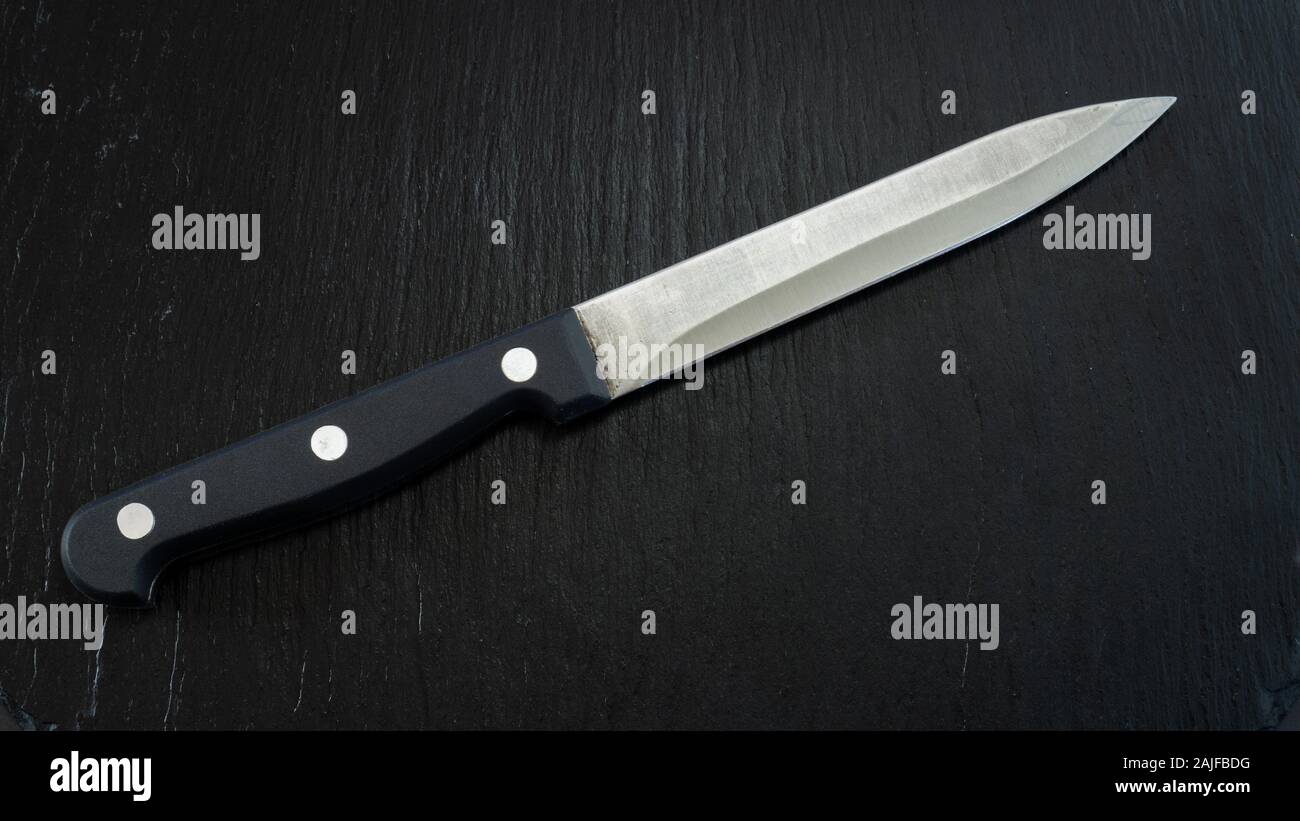 kitchen knife object on dark background photography Stock Photo Alamy