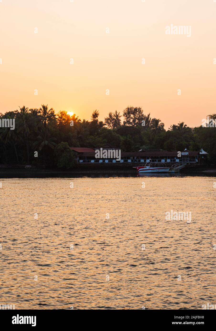 Jetty Goa India goa long boats hi-res stock photography and images - Alamy