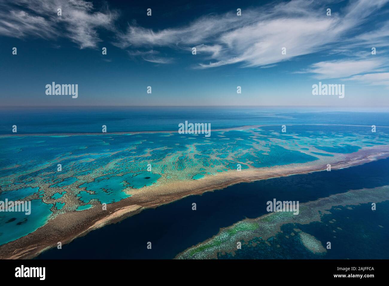 Aerial of the famous but highly endangered Great Barrier Reef. Stock Photo