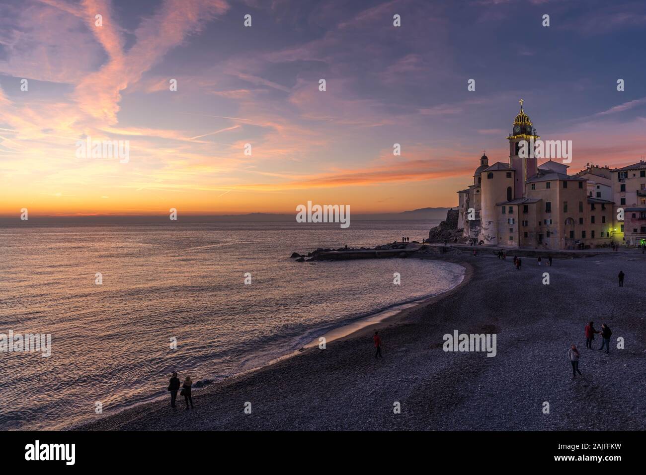 Camogli, Genova, Italy: Beautiful romantic sunset view of quaint Italian coastal village nearby Genoa Stock Photo