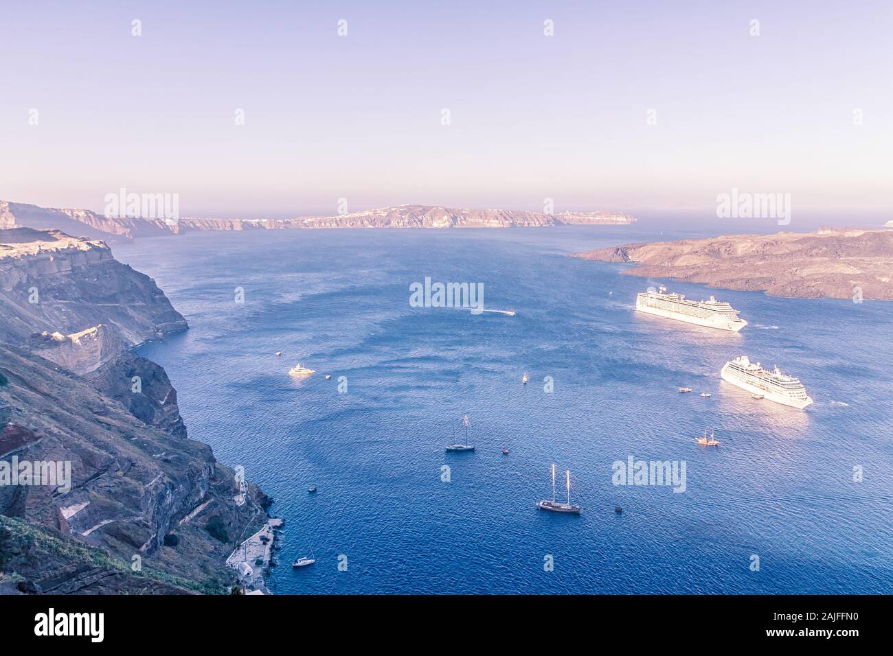 Cruise ship near volcano on island of Santorini Stock Photo Alamy