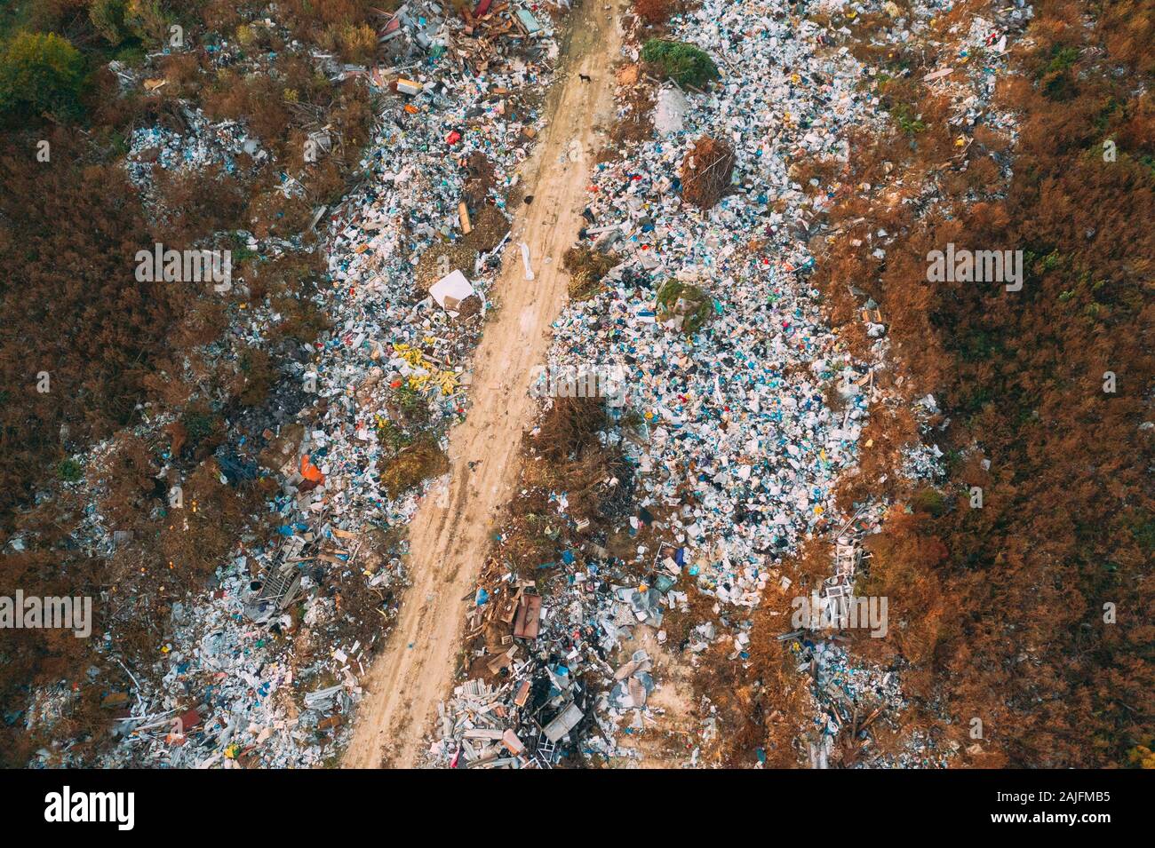 Aerial View Of Domestic Garbage. Bird's-eye View Of Junk. Domestic Waste In Landfill Junkyard. Eco Concept Garbage Disaster From Ecological Pollution Stock Photo