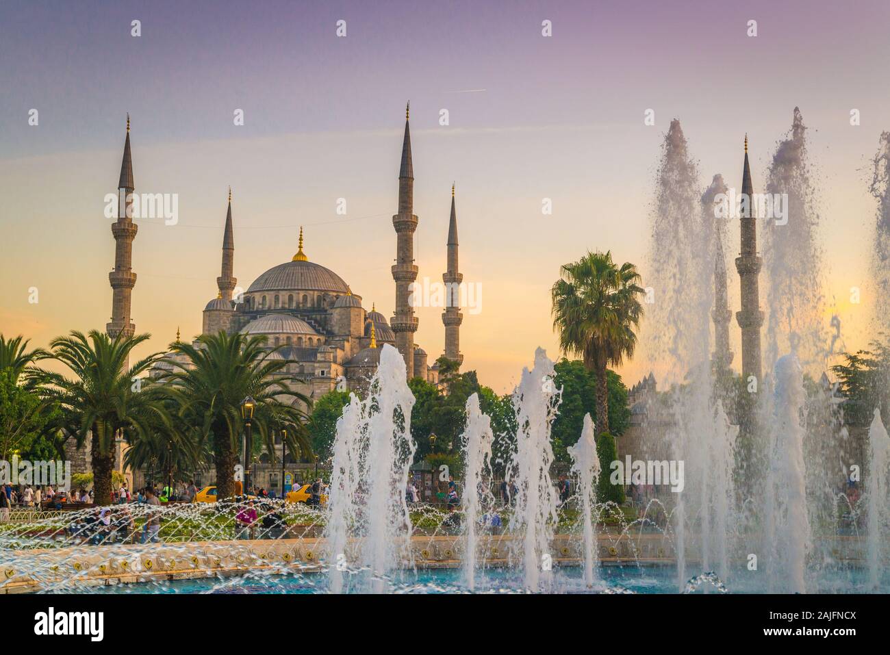 A view of the Blue Mosque during sunset from the fountain in ...