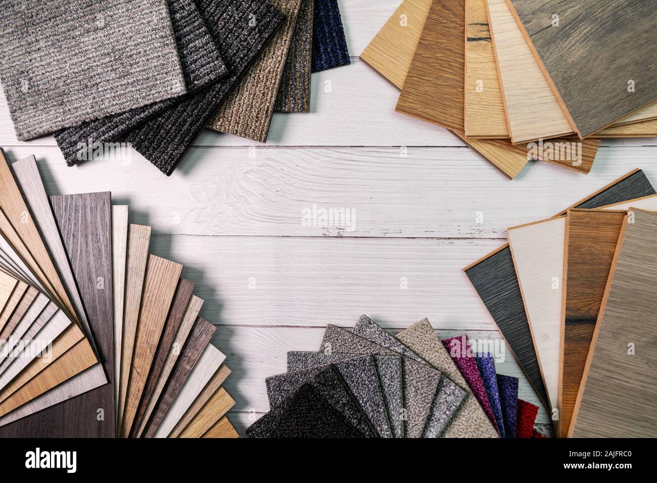 flooring and furniture materials floor carpet and wooden laminate samples with copy space