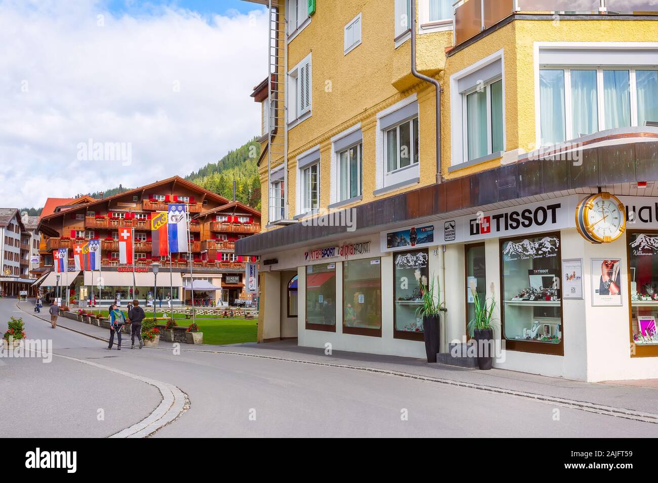 Wengen, Switzerland - October 10, 2019 : Town street view of alpine village in Swiss Alps, autumn mountains, popular resort in Bernese Oberland Stock Photo