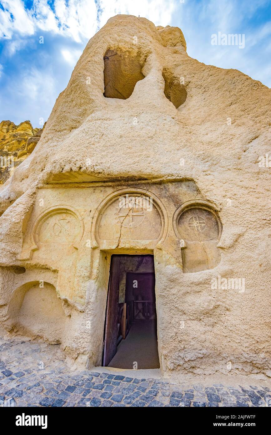 Door to the Chapel of St. Catherine in Goreme Open Air Museum (UNESCO heritage site) in Cappadocia, Turkey Stock Photo