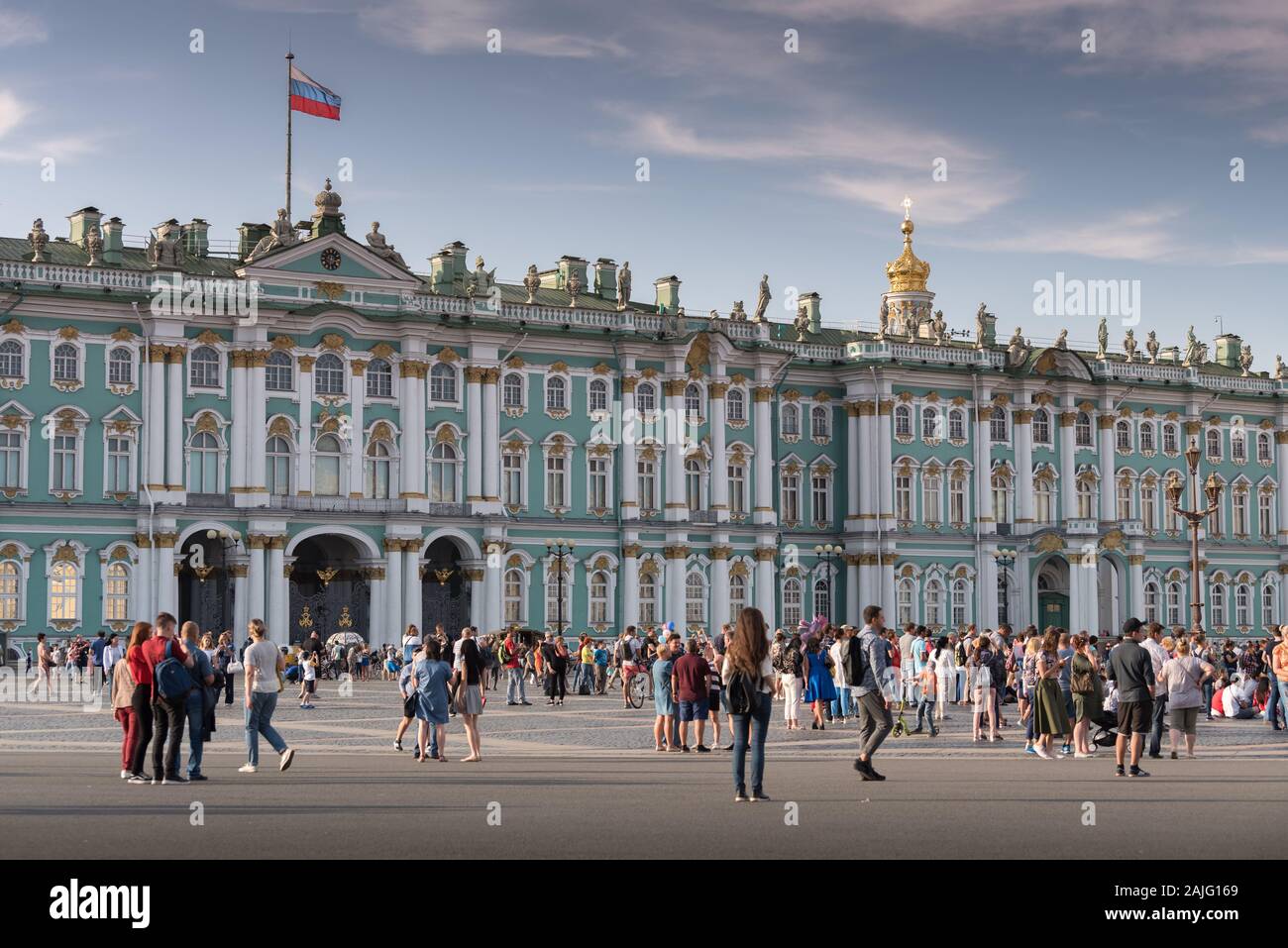 Saint Petersburg, Russia: People in Palace Square in front of Hermitage Museum (Winter Palace), second largest art museum in the world Stock Photo