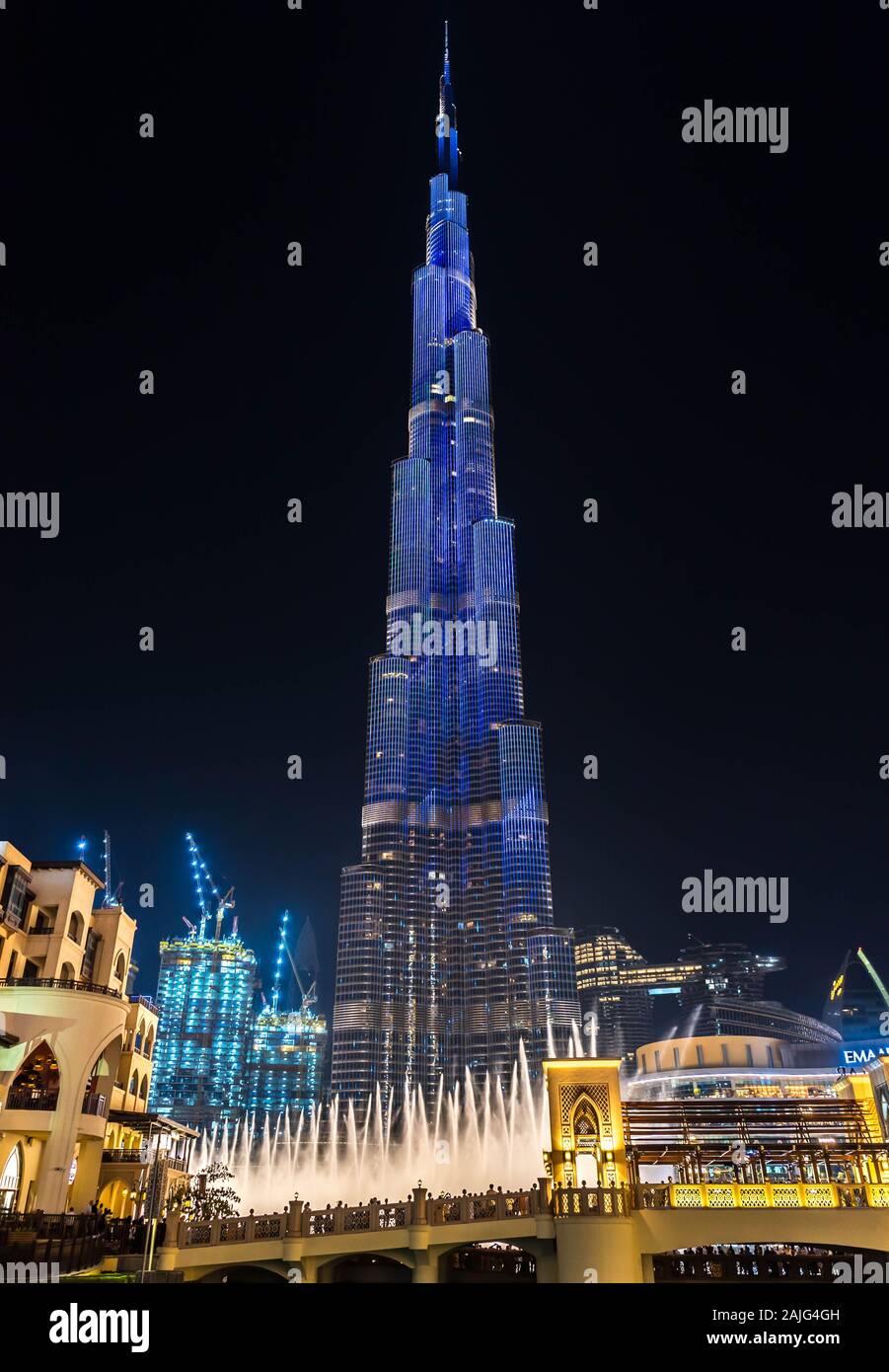 Dubai, United Arab Emirates: Amazing futuristic light show on the Burj Khalifa, the tallest building skyscraper in the world, illuminated by night Stock Photo
