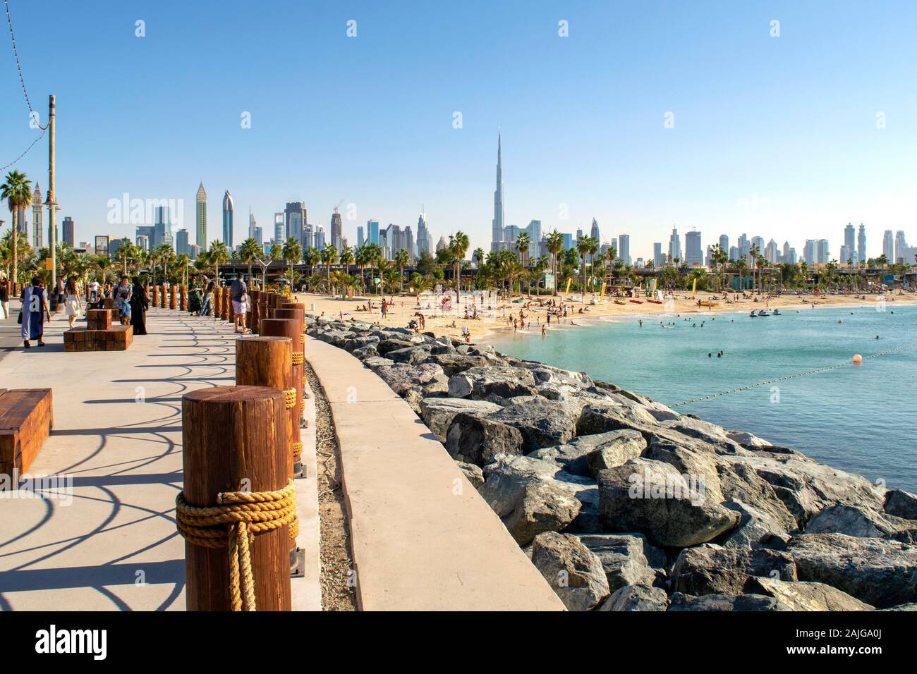 Dubai / UAE - December 20, 2019: La Mer Beach in Dubai. New public urban beach with beautiful city background. La Mer walk Stock Photo