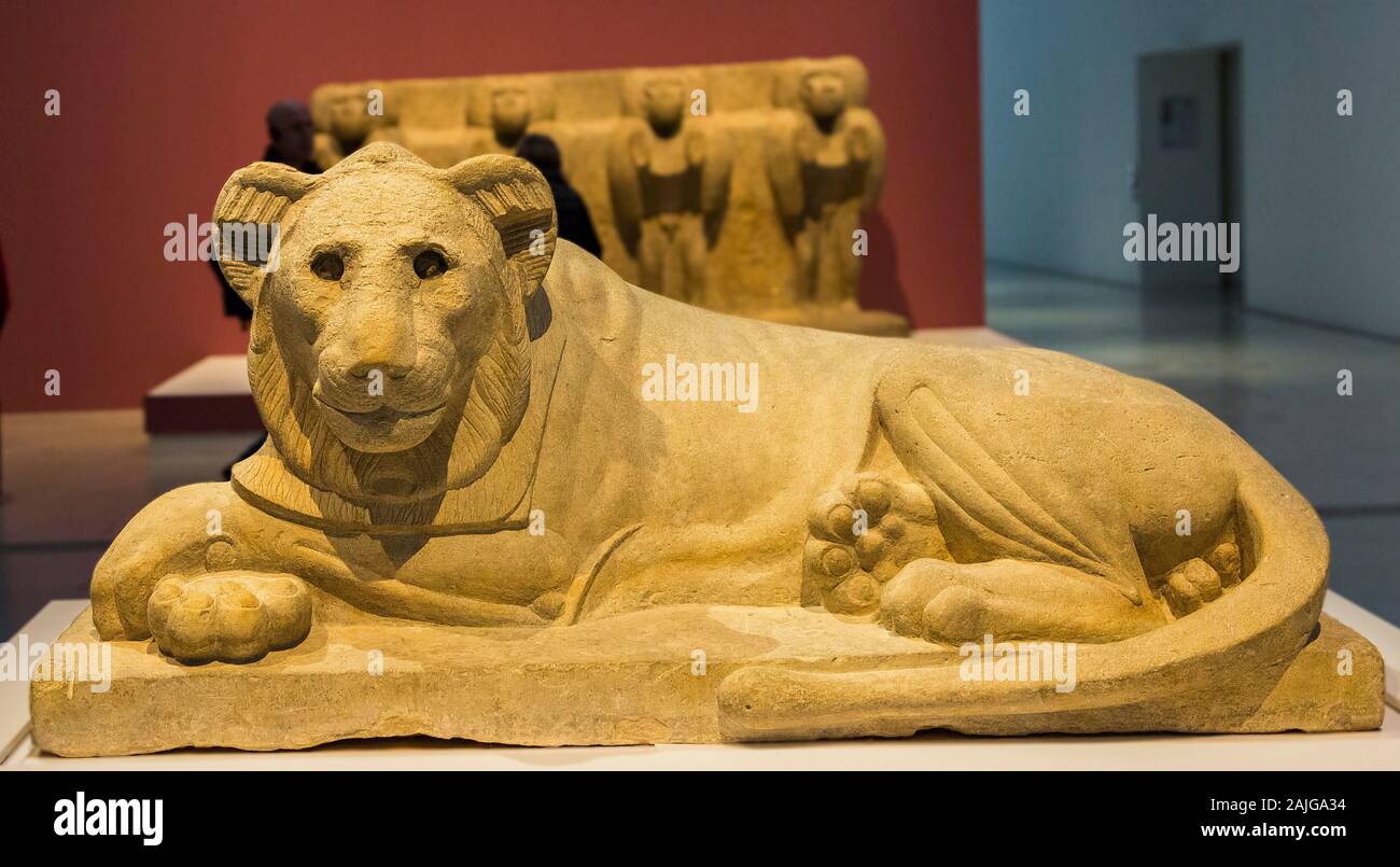 Exhibition 'The animal kingdom in Ancient Egypt', organized in 2015 by the Louvre-Lens Museum. Lion statue. Stock Photo