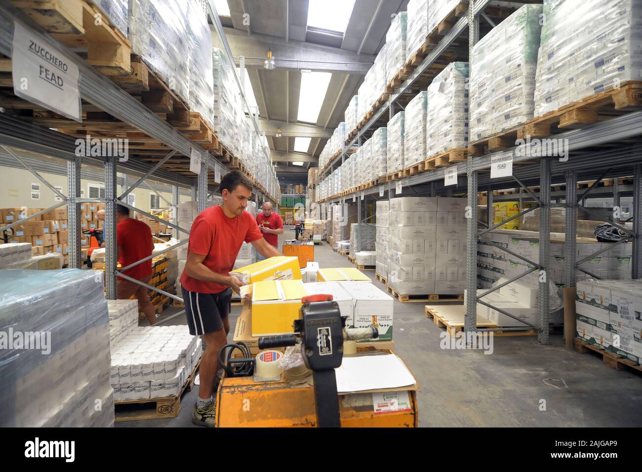 Italy, warehouse of the foundation Food Bank (Muggiò, Monza, Milan): collect food supplies donated by alimentary companies and the European Community and redistributes them to charitable organizations Stock Photo