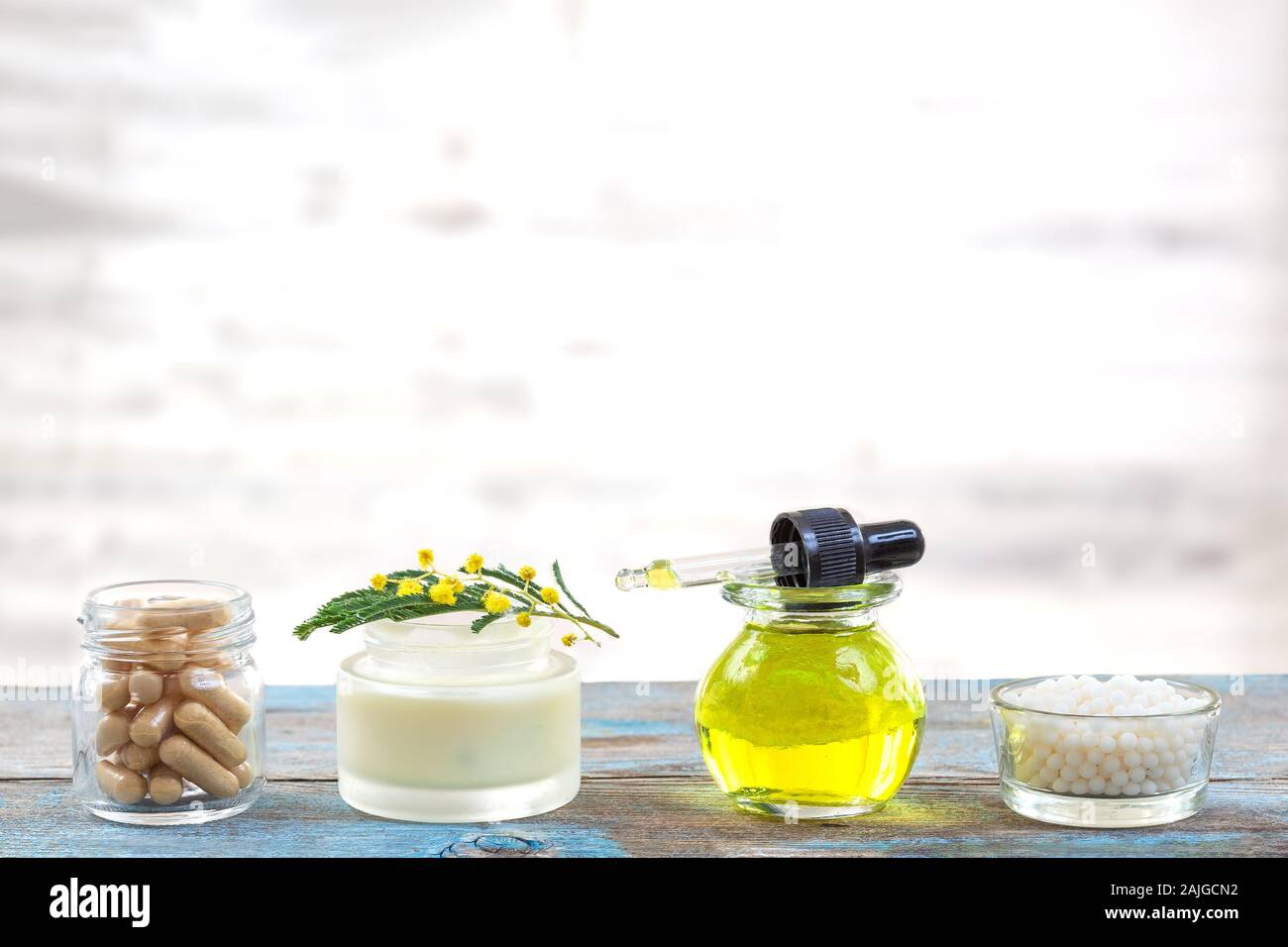 Healthcare and bodycare : products derived from mimosa for health and cosmetics Stock Photo