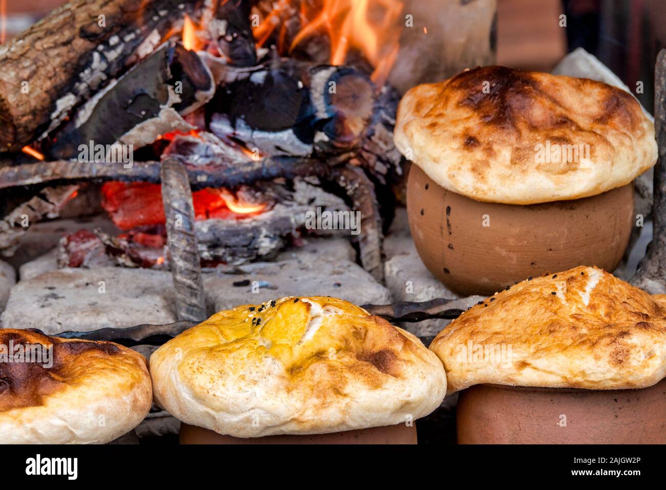 Turkish bread near the fire Stock Photo