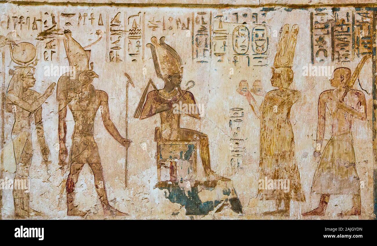 Thebes in Egypt, Assassif (Valley of the Nobles), tomb of Pabasa : The God's wife of Amun Shepenupet and Pabasa before Osiris, Horus and Isis. Stock Photo