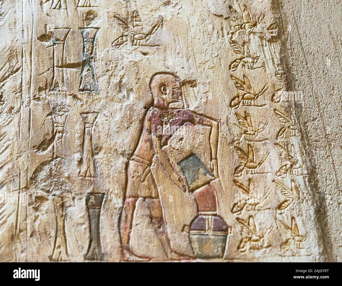 UNESCO World Heritage, Thebes in Egypt, Assassif (part of the Valley of the Nobles), tomb of Pabasa. A rare scene of beekeeping : Pouring milk. Stock Photo