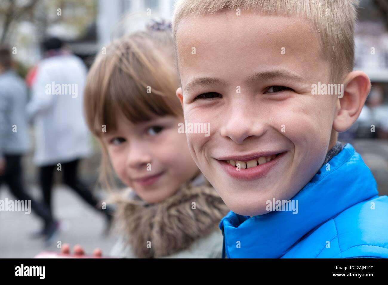 Closeup portrait of two children boy and girl tofether outdoors Stock ...