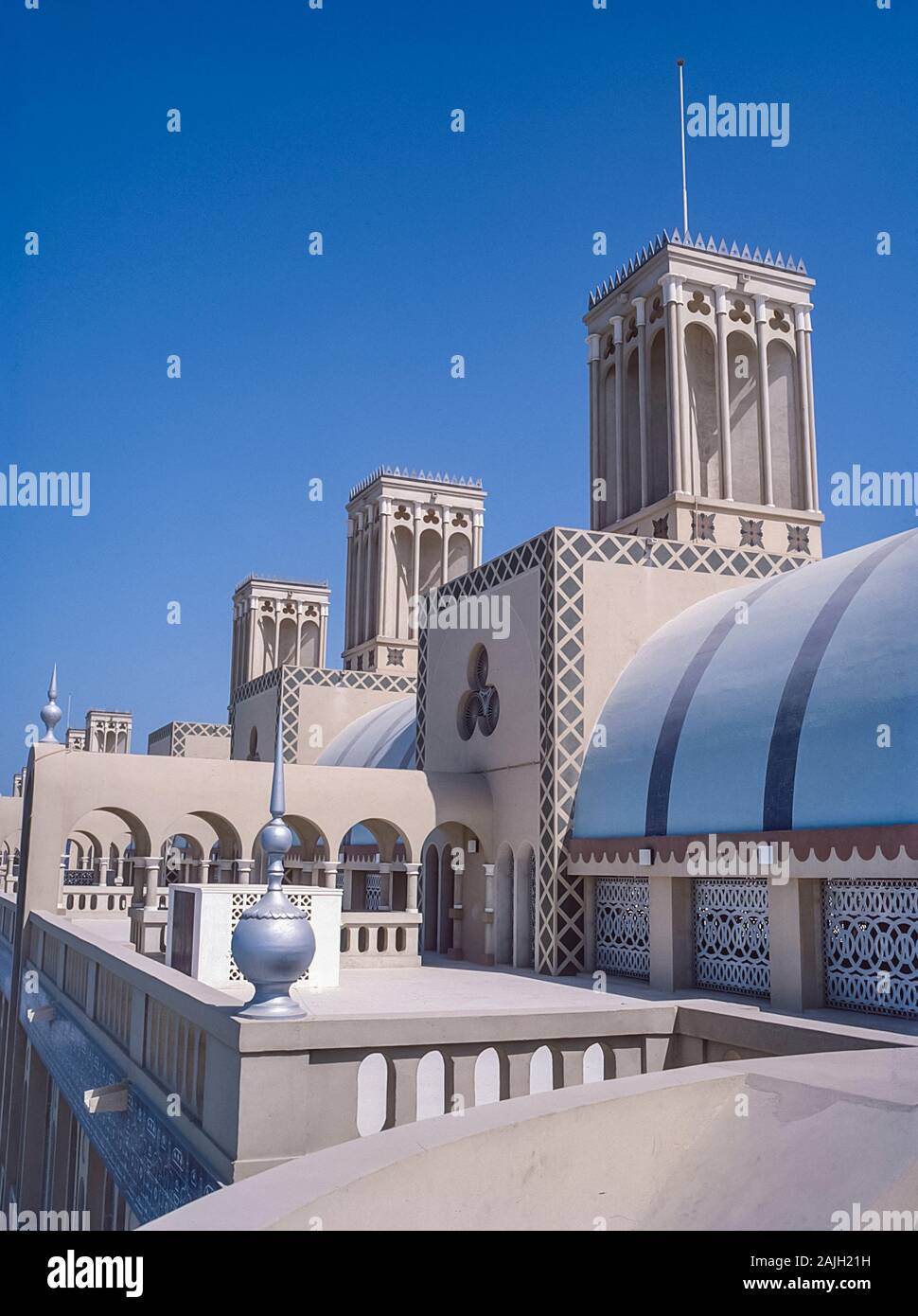 Sharjah. Colourful Sharjah at the New Suq covered market with its distinctive Arabian style wind towers Stock Photo