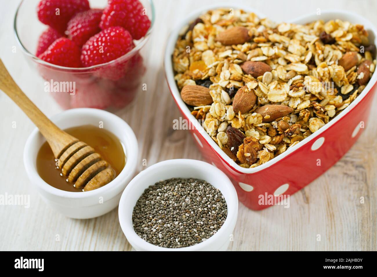 healthy snack granola on wooden surface Stock Photo Alamy