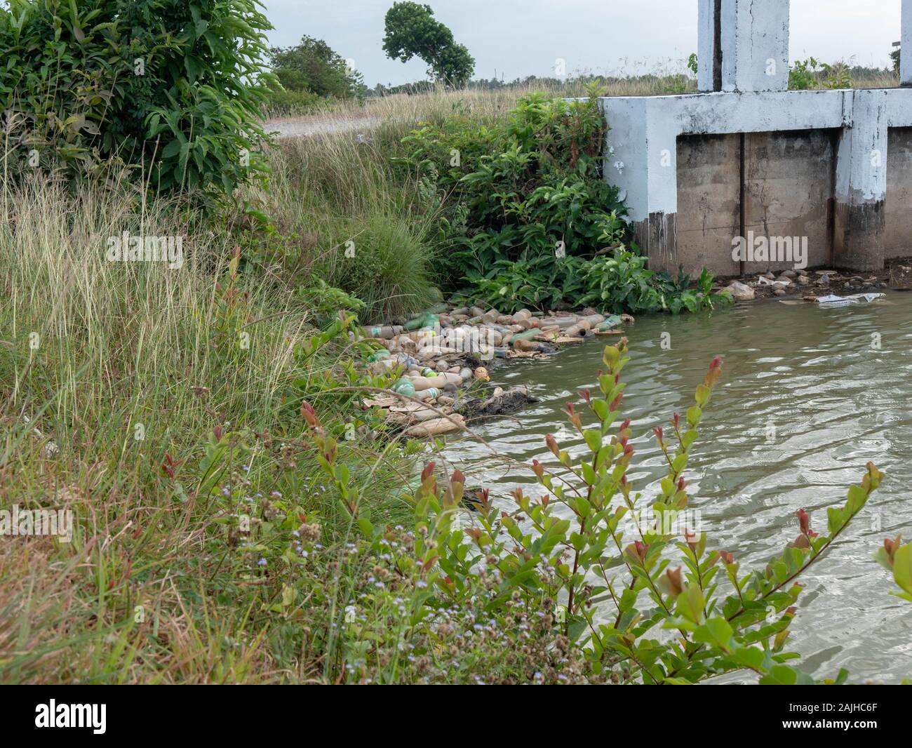 plastic bottle river Stock Photo