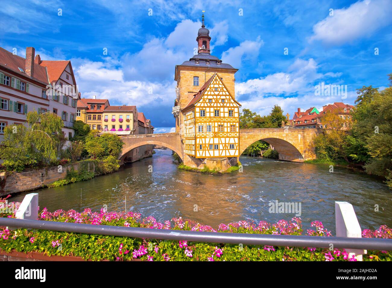 Bamberg. Scenic view of Old Town Hall of Bamberg (Altes Rathaus) with two bridges over the Regnitz river, Upper Franconia, Bavaria region of Germany Stock Photo