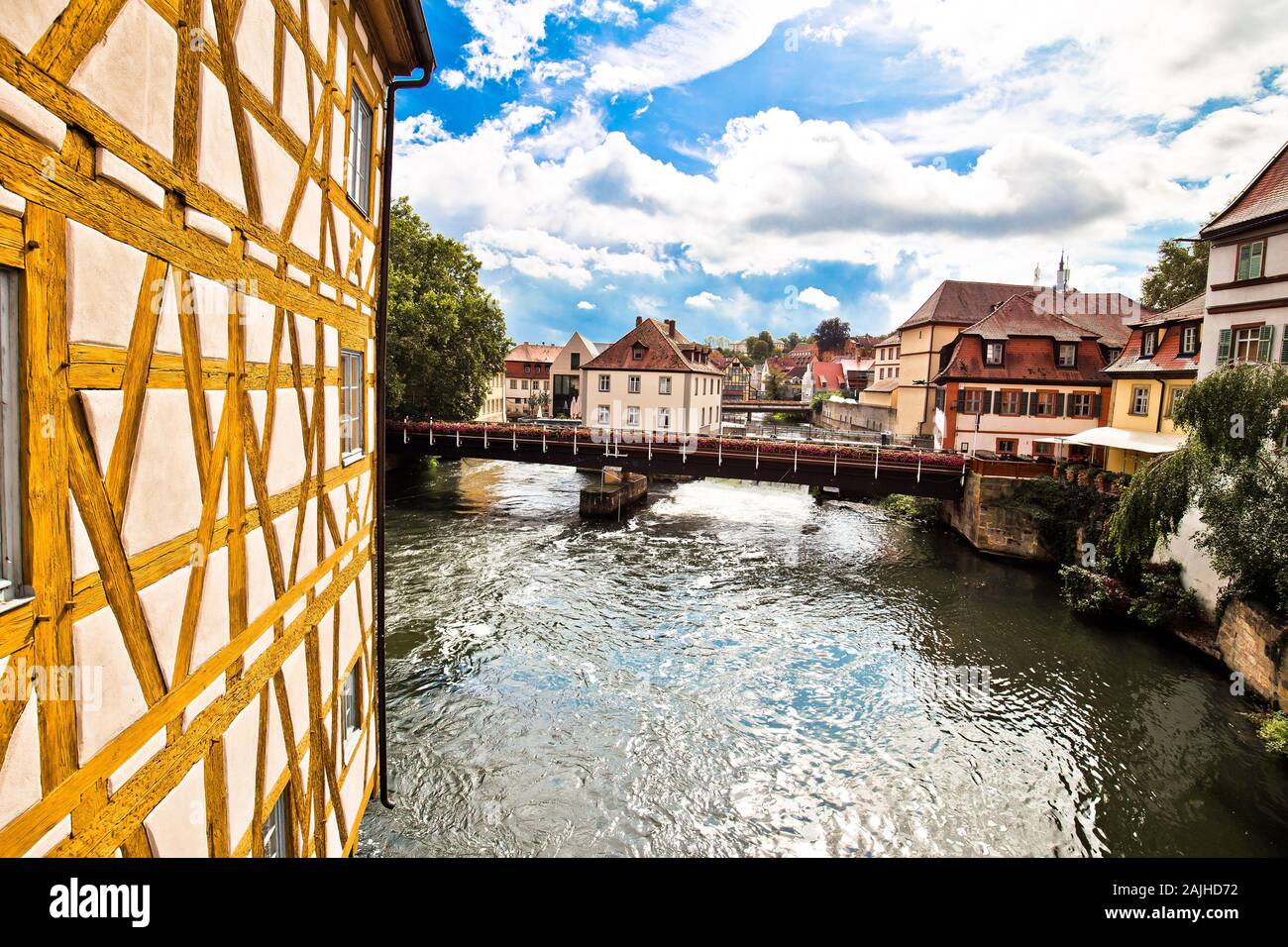 Bamberg. Scenic view of Old Town Hall of Bamberg (Altes Rathaus) with bridges over the Regnitz river, Upper Franconia, Bavaria region of Germany Stock Photo
